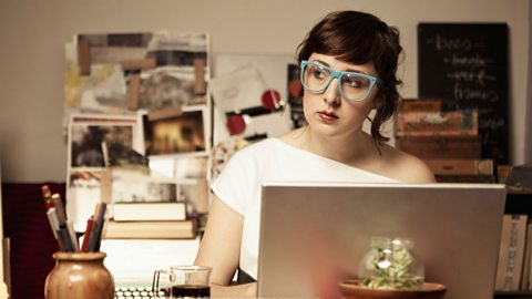 Female blogger working from home office