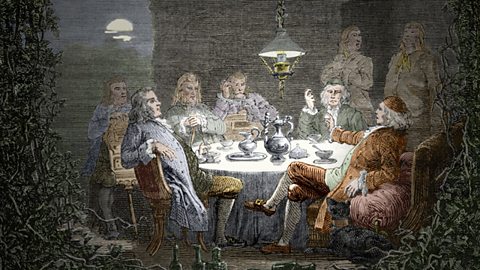  A group of industrialists and Natural Philosophers sitting around a table. They were called the 'Lunar society'. Both of Darwin's grandfathers belonged to the 'Lunar Society'
