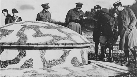 French soldiers inspect a defensive building on the Maginot Line