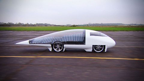 What do a solar-powered car and a green plant have in common?