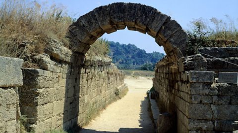 Photo of an archway that ancient Olympic athletes would walk under to enter the stadium.