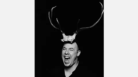 Marc Hom/Trunk Archive “Abhuman” motifs are found everywhere in McQueen’s work – the designer (pictured here) explored the idea by incorporating antlers into his pieces. (Credit: Marc Hom/Trunk Archive)