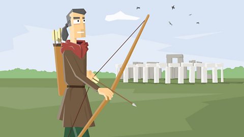 The Amesbury Archer standing near Stonehenge with his arrow and bow drawn ready to use