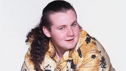 FremantleMedia Ryan Maloney’s character Toadfish Rebecchi – seen here in his mid-’90s pomp – has clocked up nearly 20 years on the show (Credit: FremantleMedia)