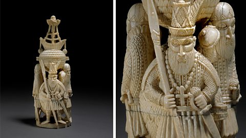 A carved ivory salt container showing merchants