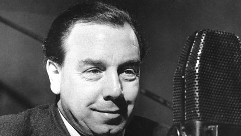  A black and white photo of J B Priestley recording for the BBC