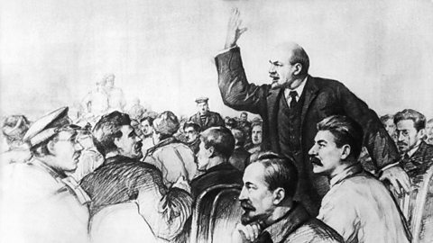 Lenin speaks at the First All-Russian Congress of Soviets with Stalin at his side