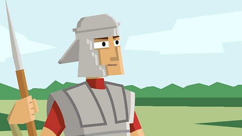 A roman soldier looks on.