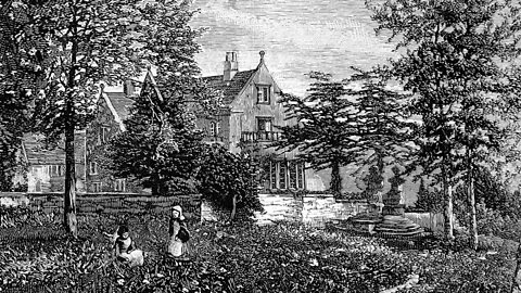 Florence Nightingale's home in Derbyshire, seen through a garden with trees.