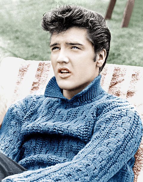  Elvis in 1957, his hair a prominent quiff. 