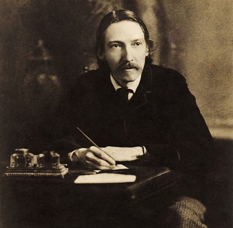 Robert Louis Stevenson, writing at his desk.