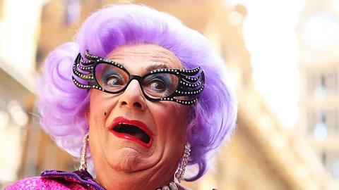 Getty Comedian Barry Humphries created cultural export Dame Edna Everage, as well as a few quirky turns of phrase. (Credit: Getty)