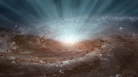 A supermassive black hole is hurtling away from its home galaxy