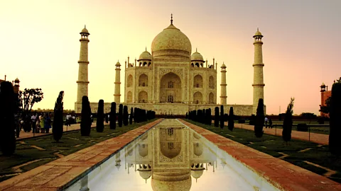 Thinkstock The Taj Mahal is enveloped in pastels as the sun sets (Credit: Thinkstock)