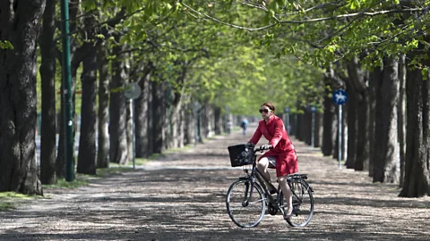 Joe Klamar/AFP/Getty Images Riding through Prater Park (Credit: Joe Klamar/AFP/Getty Images)