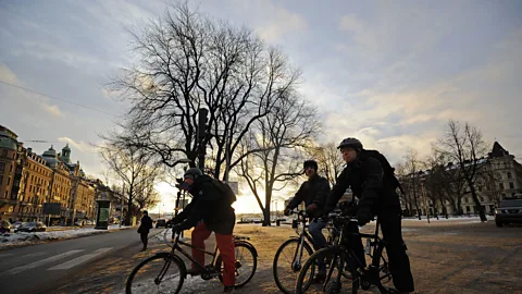 Olivier Morin/Getty Cyclists in downtown Stockholm (Credit: Olivier Morin/Getty)