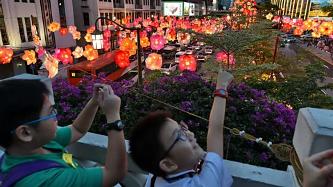 Roslan Rahman/Getty The Mid-Autumn festival in Singapore (Credit: Roslan Rahman/Getty)
