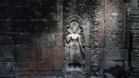 Christophe Archambault/Getty A traditional Aspara dancer at Ta Phrom temple (Credit: Christophe Archambault/Getty)