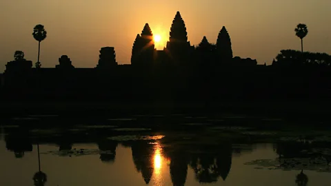 Tang Chhin Sothy/Getty Dusk at Angkor Wat (Credit: Tang Chhin Sothy/Getty)