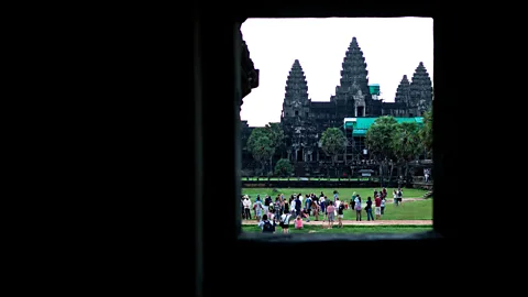 Brendan Smialowski/Getty Dawn at Angkor Wat (Credit: Brendan Smialowski/Getty)