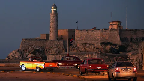 Chip Somodevilla/Getty Images Cars drive past the Castillo San Felipe del Morro (Credit: Chip Somodevilla/Getty Images)