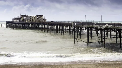 Teo73/Thinkstock by Getty Images After its 2006 closure for safety reasons, the pier of Hastings was partly destroyed by fire in 2010; it is currently under restoration. (Credit: Teo73/Thinkstock by Getty Images)