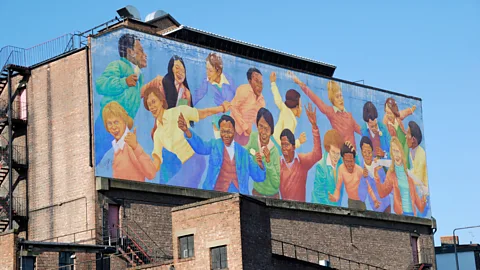 Loop Images Ltd/Alamy Today's London is thoroughly multicultural, as this mural in London's Brixton neighbourhood celebrates (Credit: Loop Images Ltd/Alamy)