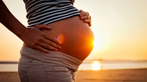 Getty Images Women are more likely to give birth to sons when the climate is pleasant (Credit: Getty Images)