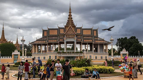 Omar Havana/Getty Images Phnom Penh's vendors in front of the Royal Palace (Credit: Omar Havana/Getty Images)