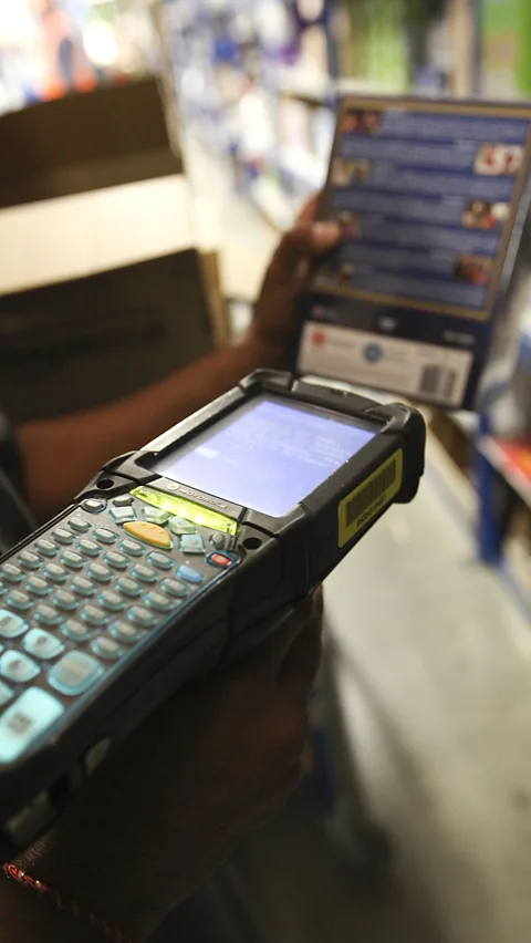 Rex Scanners instruct the pickers where to go, and reportedly count down in seconds how long it should take (Credit: Rex)