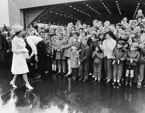 A black and white photograph of Queen Elizabeth II meeting a crowd of people in Hobart, Tasmania in 1970.