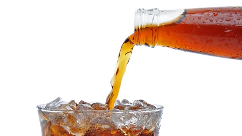 Getty Images The eroding effects of sweet fizzy drinks add up over time (Credit: Getty Images)