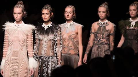 Getty Images Valentino came under fire for cultural appropriation – its mostly-white models wore cornrows in their hair in a collection inspired by “wild, tribal Africa” (Credit: Getty Images)