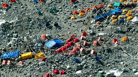 Getty Images Bright tents mark the human presence in what was once a wilderness (Credit: Getty Images)