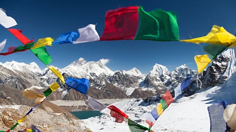 iStock Prayer flags strung up to bless the surroundings (Credit: iStock)