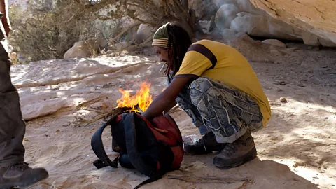 Will Jehring Feeding the fire before dinner (Credit: Will Jehring)