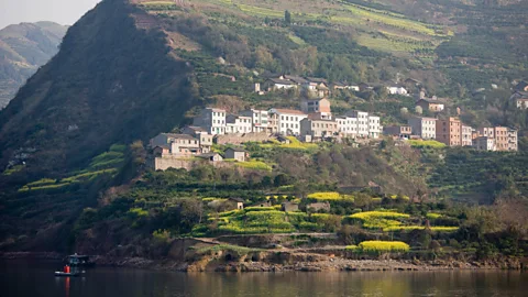 Getty Images Many residents have had to be moved into newly built towns further along the river (Credit: Getty Images)