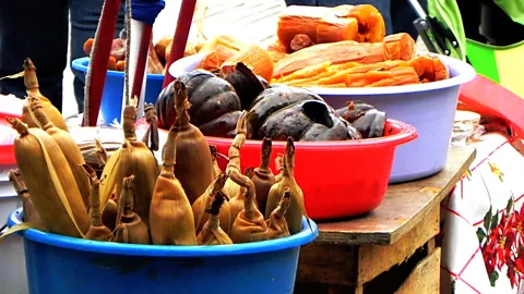Razi Marysol Machay/Flickr/CC-BY-SA-2.0 Calabazas are sold seasonally alongside other harvest bounty (Credit: Razi Marysol Machay/Flickr/CC-BY-SA-2.0)