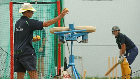 An automatic bowling machine being used in training by Australian cricketers