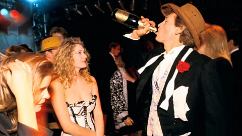 CountryCollection - Homer Sykes/Alamy Young people party at a university ball; in the 2000s, drinking, and getting drunk, increasingly became the domain of 20-somethings (Credit: CountryCollection - Homer Sykes/Alamy)