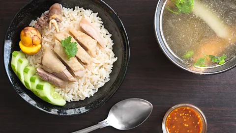 Kidsada Manchinda/Alamy The dish is an ensemble of boiled chicken, rice, chilli sauce and chicken soup (Credit: Kidsada Manchinda/Alamy)