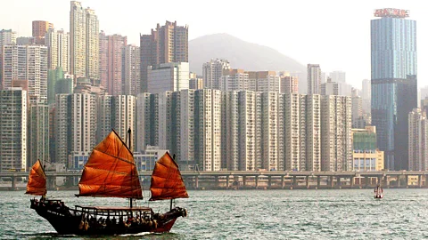 Philippe Lopez/Getty A traditional Chinese junk ship, once found in Macau, sails through Hong Kong (Credit: Philippe Lopez/Getty)