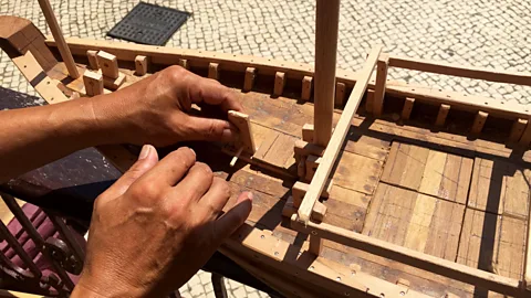 Kate Springer Before making replicas, Wan built 300 traditional boats (Credit: Kate Springer)