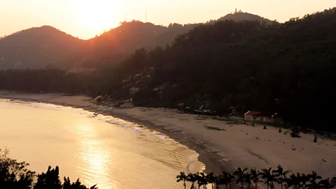 Wamodo/Alamy Sunset falls on Coloane's empty shores (Credit: Wamodo/Alamy)