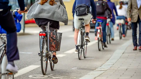 Tobias Ackeborn/Getty Images Many commuters travel to work by bike. (Credit: Tobias Ackeborn/Getty Images)