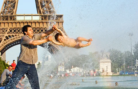 Look Die Bildagentur der Fotografen GmbH/Alamy Playing in front of the Eiffel Tower (Credit: Look Die Bildagentur der Fotografen GmbH/Alamy)