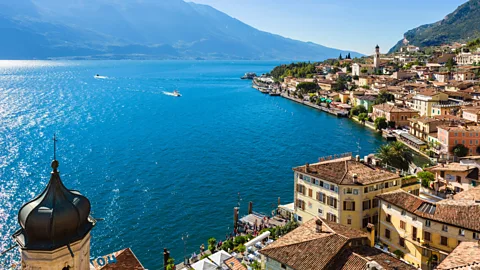 Ian Dagnall/Alamy Italians love to vacation at beautiful locales like Lake Garda (Credit: Ian Dagnall/Alamy)