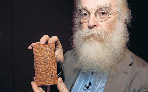 Professor Irving Finkel from the British Museum's Middle East department, with the ancient Babylonia tablet he deciphered in 2009.