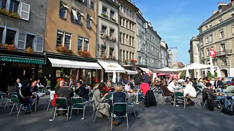 Mike Hewitt/Getty Images Cafe culture is a way of life in Geneva (Credit: Mike Hewitt/Getty Images)
