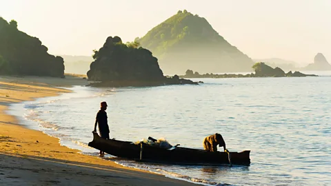 Matthew Williams-Ellis/robertharding/Alamy Fishermen returning with the daily catch in Lombok, Indonesia (Credit: Matthew Williams-Ellis/robertharding/Alamy)